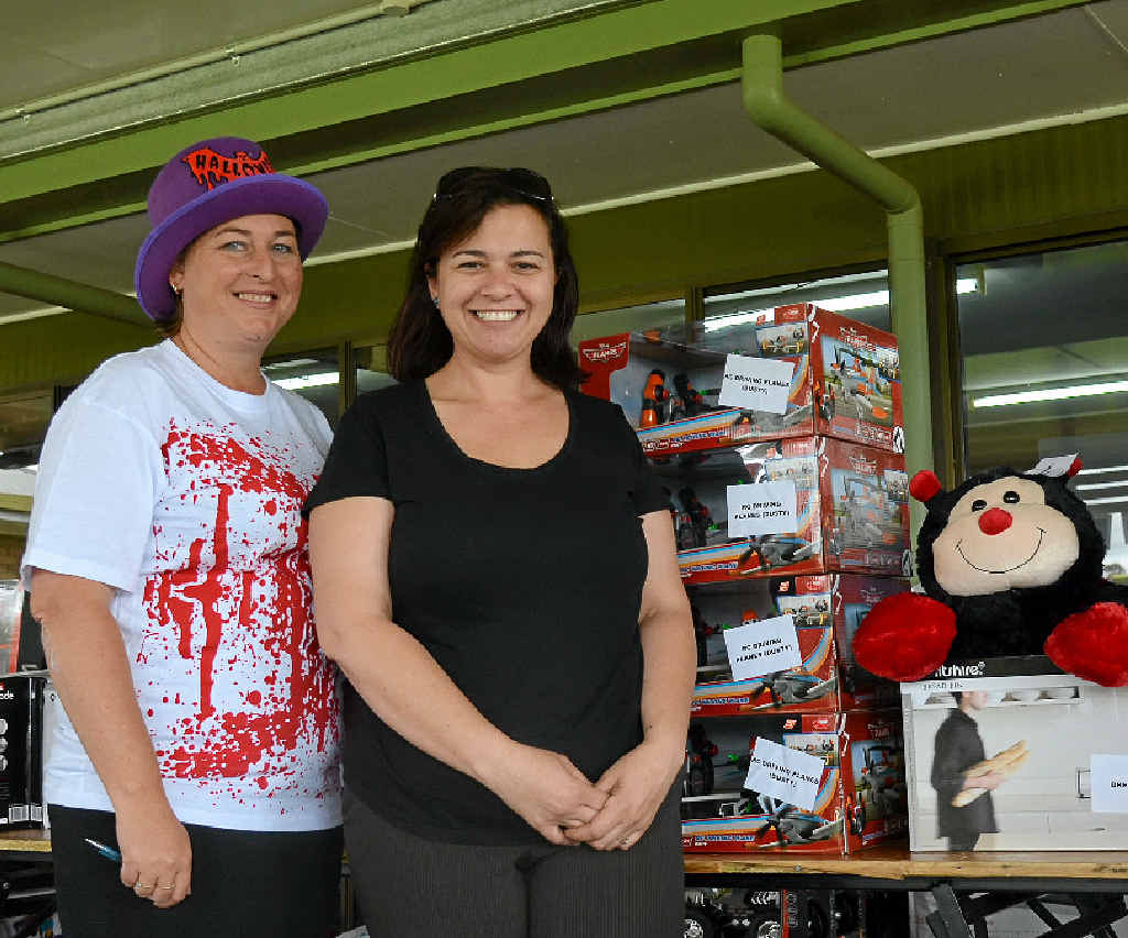 DRIVING CHARITY: Big W staff members Janine Newley and Leonie Mizzi help organise the Golf Day, including plenty of prizes. DRIVING CHARITY: Big W staff members Janine Newley and Leonie Mizzi help organise the Golf Day, including plenty of prizes.
